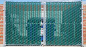 Fence around commercial dumpster