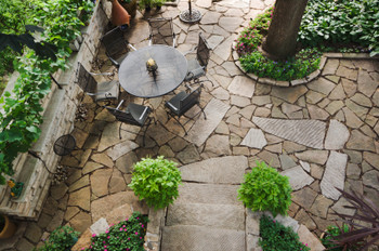 Stone patios add a decorative, elegant look to any outside area